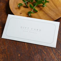 スノーホワイトコットンの質感が上品な白封筒。シルバー印刷のシンプルなフレームデザインが施された金券用ミニ封筒