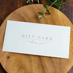 スノーホワイトコットンの質感が上品な白封筒。ゴールド印刷のシンプルデザインが施された金券用ミニ封筒