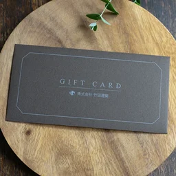 ショコラブラウン コットンの質感が上品な茶封筒。白インク印刷のシンプルな二重フレームデザインが施された金券用ミニ封筒